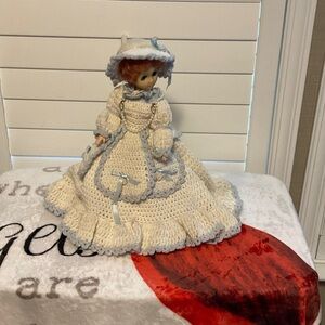 Elegant Cream and Blue Porcelain Doll